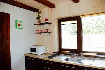 Фото номера Дом с 2 спальнями Дома для отпуска Holiday House Strawberry г. Друскининкай 25