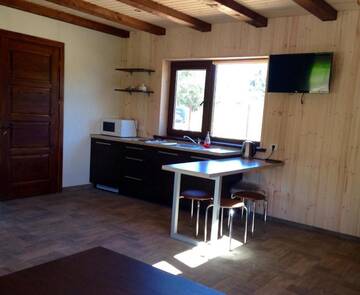 Фото номера Дом с 2 спальнями Дома для отпуска Holiday House Strawberry г. Друскининкай 32