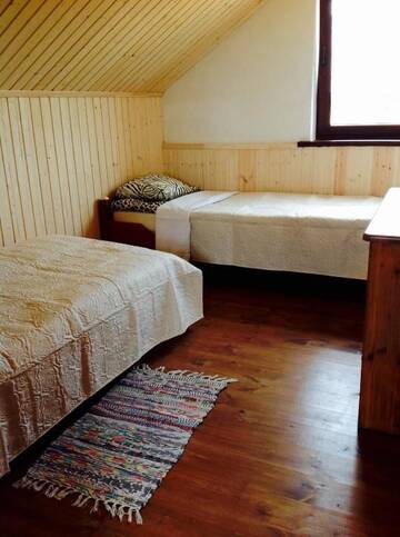 Фото номера Дом с 2 спальнями Дома для отпуска Holiday House Strawberry г. Друскининкай 34