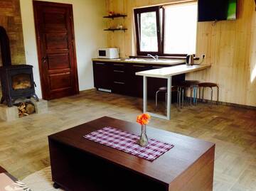 Фото номера Дом с 2 спальнями Дома для отпуска Holiday House Strawberry г. Друскининкай 36