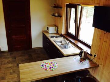 Фото номера Дом с 2 спальнями Дома для отпуска Holiday House Strawberry г. Друскининкай 42