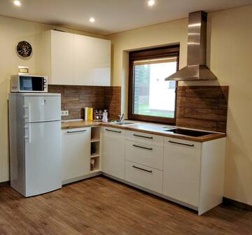 Фото номера Дом с 3 спальнями Дома для отпуска Holiday House Strawberry г. Друскининкай 12