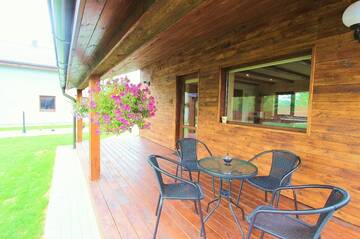 Фото номера Дом с 2 спальнями Дома для отпуска Holiday House Strawberry г. Друскининкай 2