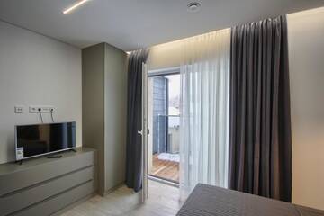 Фото номера Двухуровневые апартаменты Апартаменты Nikolas Apartamentai - Birstono 7 г. Друскининкай 24