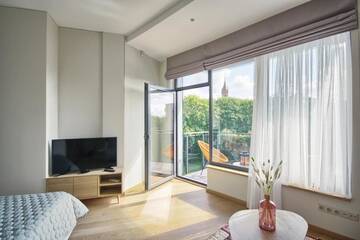 Фото номера Номер-студио с балконом Апартаменты Korio Apartments, Druskininkai г. Друскининкай 2