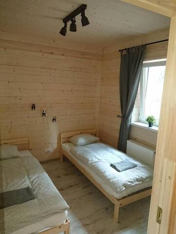 Фото номера Дом с 2 спальнями Дома для отпуска Mizarai Mill House г. Друскининкай 10