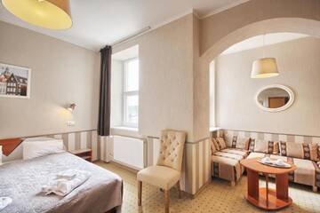 Фото номера Улучшенный двухместный номер с 1 кроватью Отель Inza Hotel г. Друскининкай 2