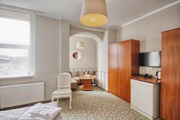 Фото номера Улучшенный двухместный номер с 1 кроватью Отель Inza Hotel г. Друскининкай 3