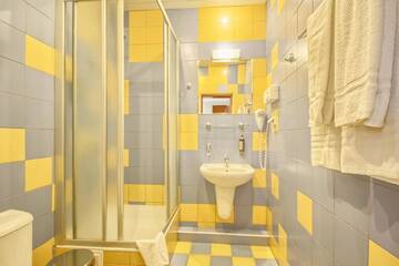 Фото номера Улучшенный двухместный номер с 1 кроватью Отель Inza Hotel г. Друскининкай 4