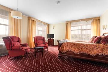 Фото номера Суперлюкс Гостевой дом Mineraliniai Apartamentai г. Друскининкай 4