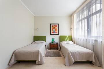 Фото номера Двухместный номер с 2 отдельными кроватями Гостевой дом Mineraliniai Apartamentai г. Друскининкай 4