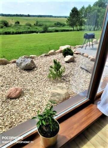 Фото номера Дом с 4 спальнями Дома для отпуска Holiday Homes Eliza г. Друскининкай 9