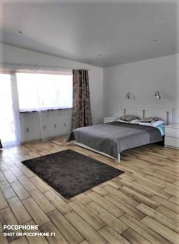 Фото номера Дом с 4 спальнями Дома для отпуска Holiday Homes Eliza г. Друскининкай 11